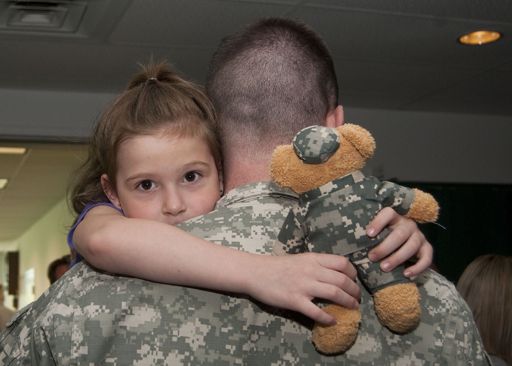 Service member welcomed home by family and community